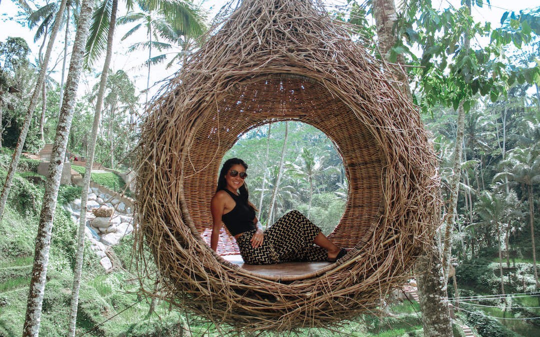 solo vacation - girl in birds nest in bali