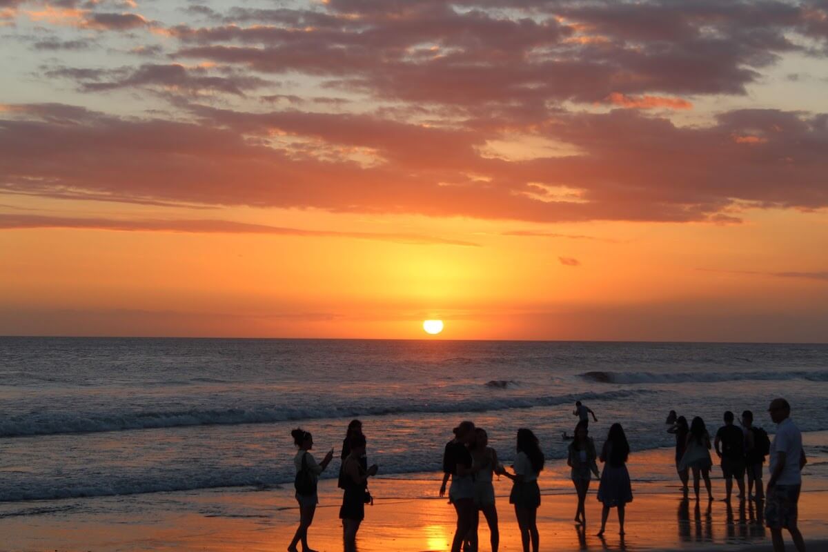 solo vacation - sunset at the beach in canggu bali