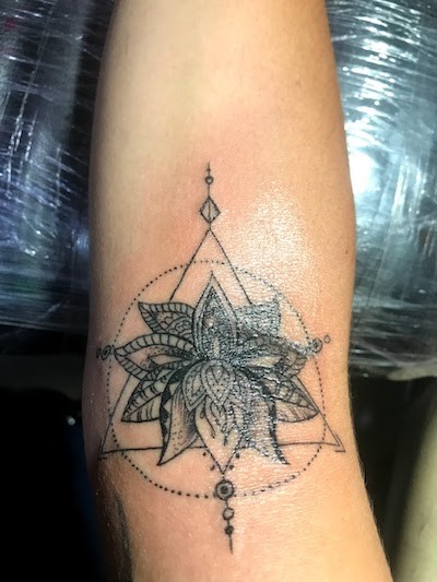 solo vacation - lotus flower tattoo on forearm in bali