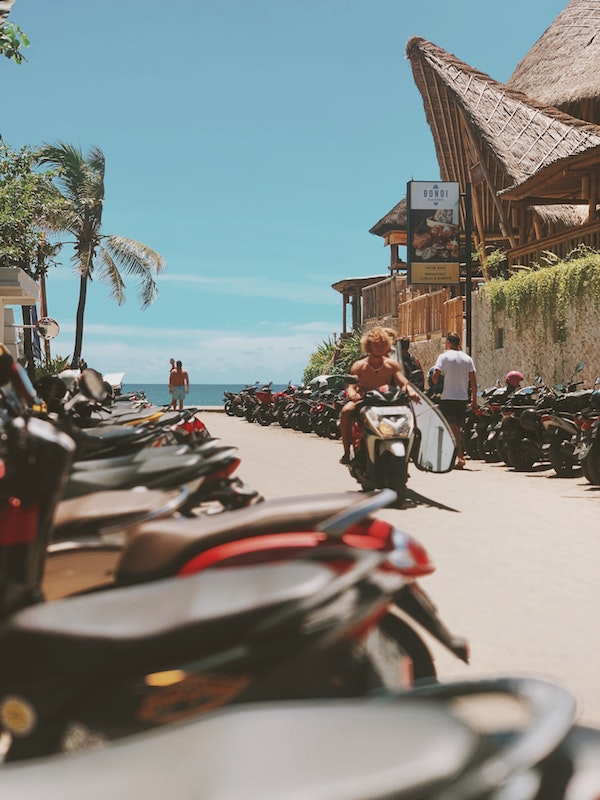 scooters at the beach in canggu in bali