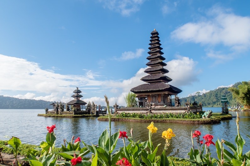 travel to bali - temple in bali floating in the water