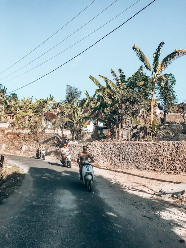 travel to bali - guys riding on scooters in bali 