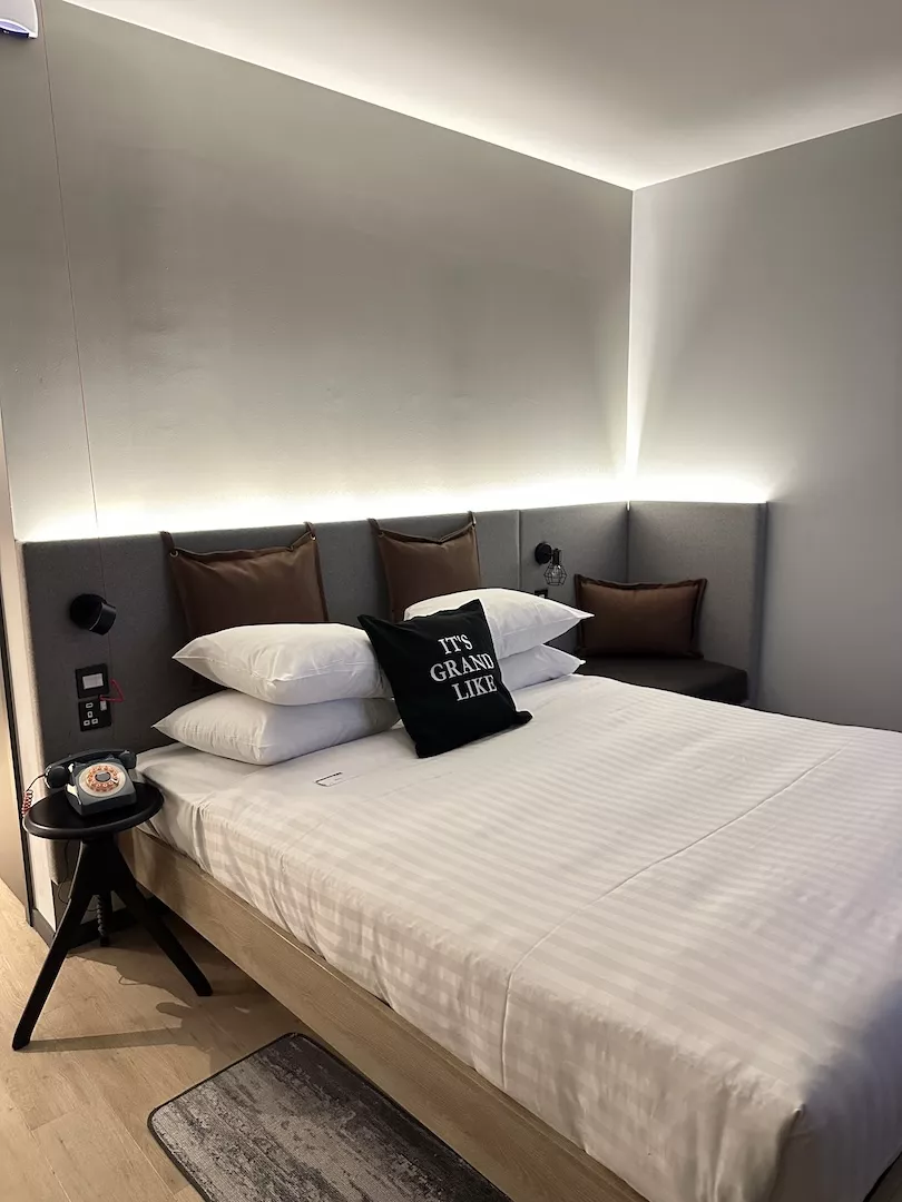 The lovely bed in a room from the Moxy Hotel 