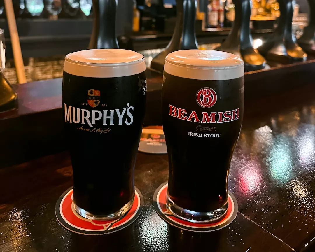 Photo of two stouts made in Cork Ireland - Beamish and Murphys